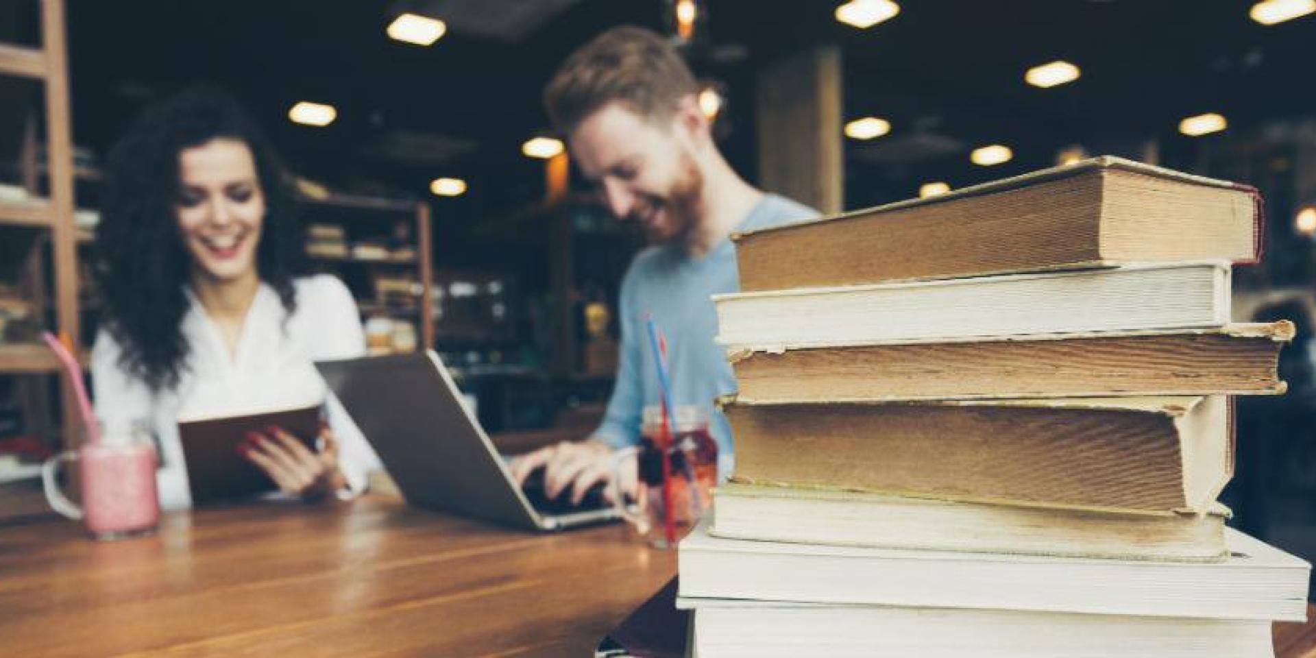 Couple studying in library